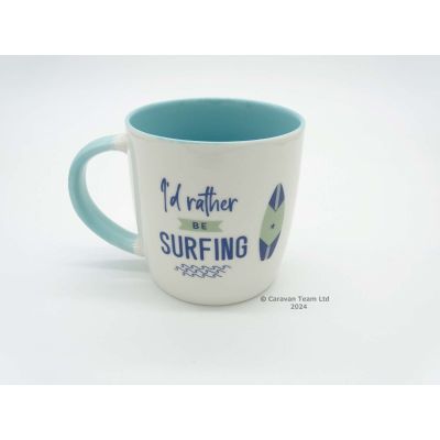 Blue and white mug decorated with a surf board and text I'd rather be surfing